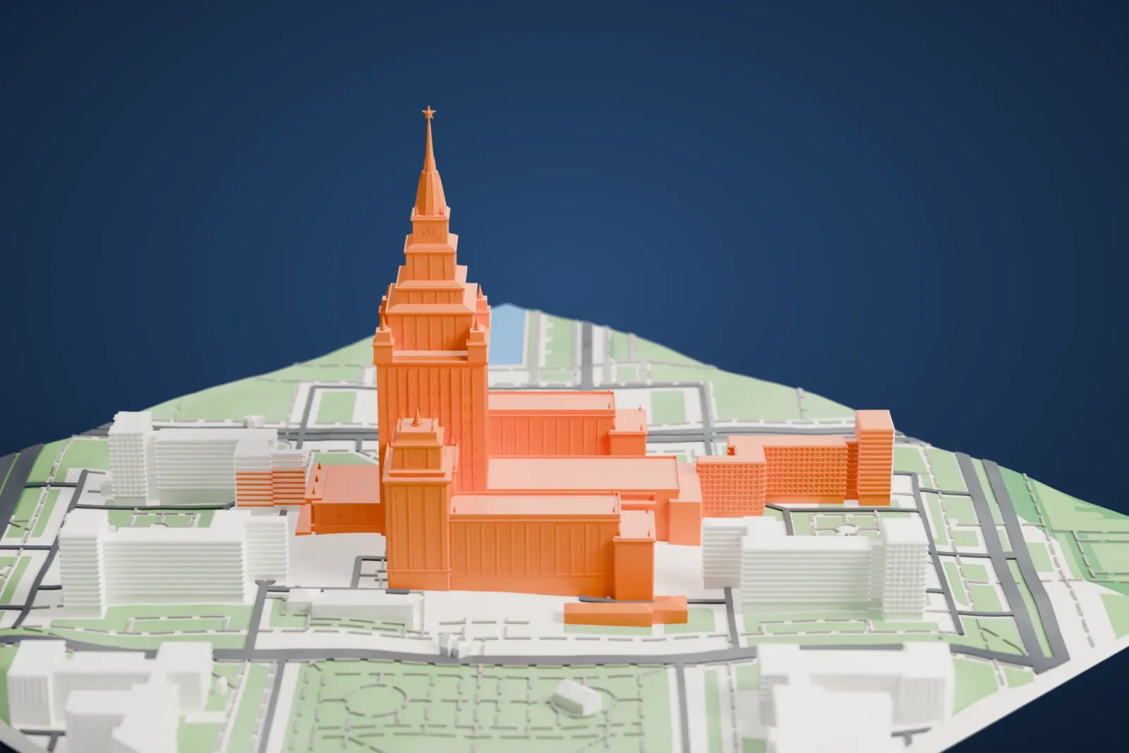 A white 3D print of Moscow State University's main building, a stepped central tower with a spire and corner towers, surrounded by streets, park areas and other buildings.