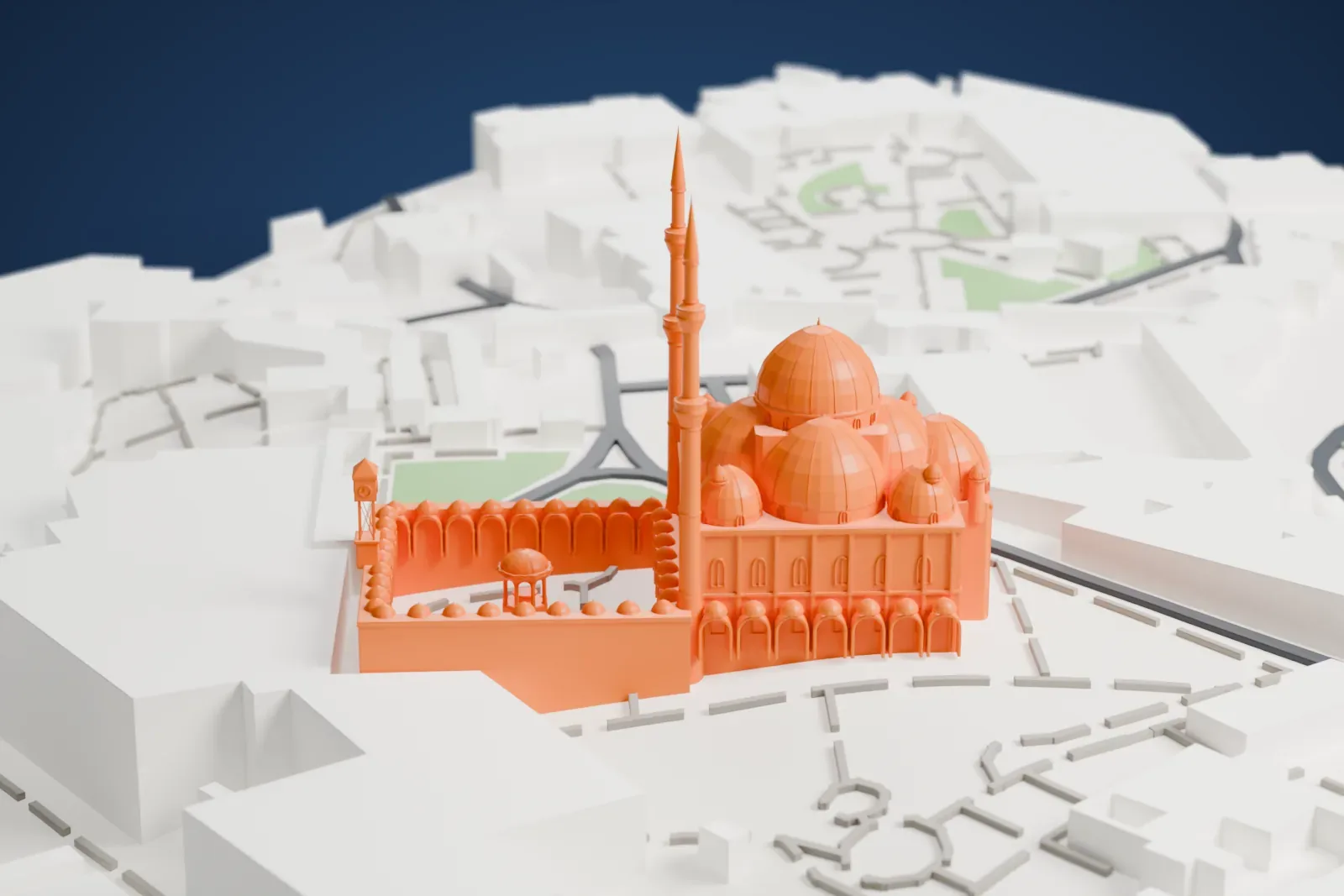 A white 3D print of the Mosque of Muhammad Ali, with a cluster of domes, two tall slender minarets and a courtyard ringed by small domes, set among large buildings and roads.