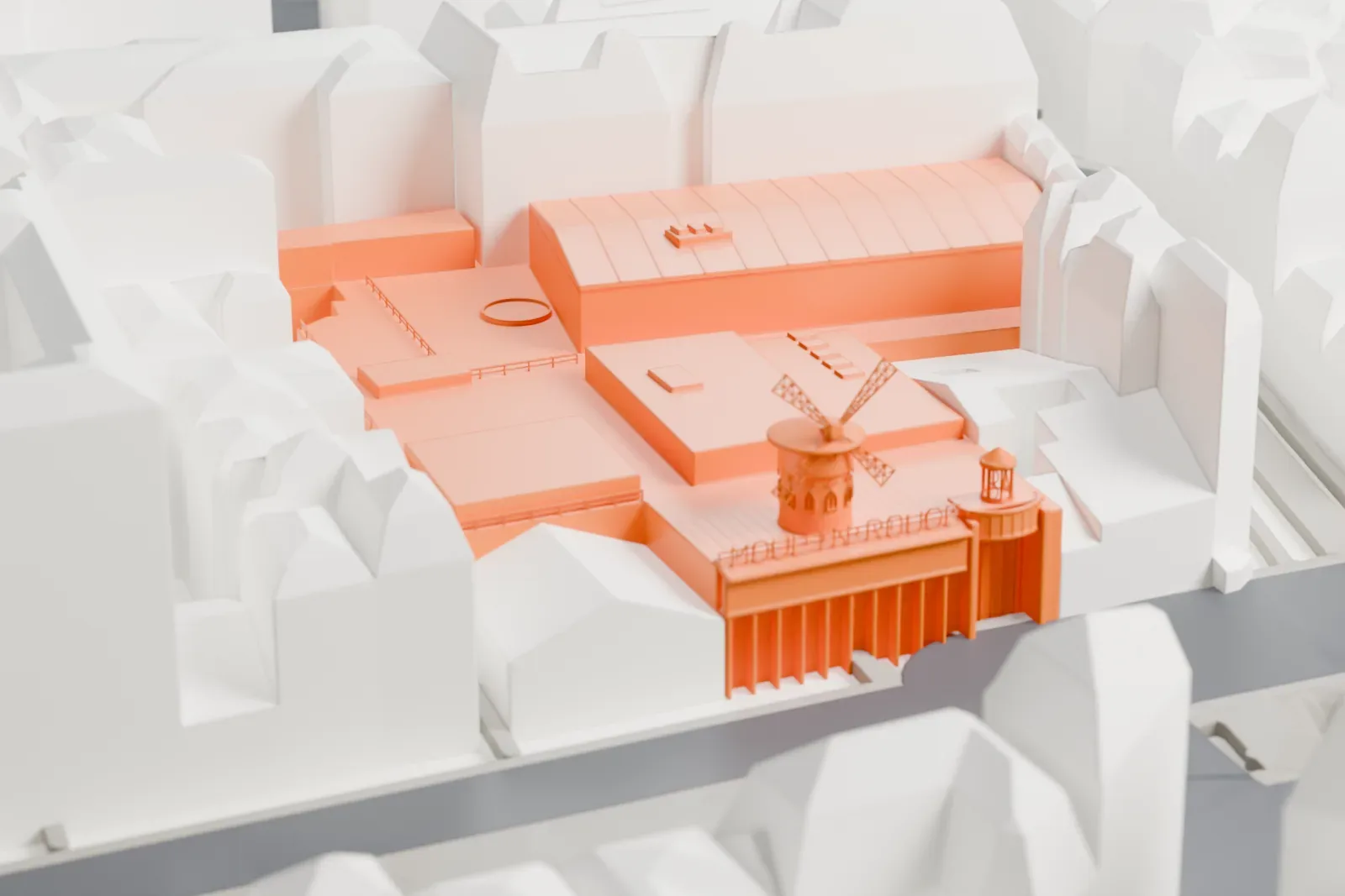 A white 3D print of the Moulin Rouge, its rooftop windmill above a low block, standing among the surrounding streets and buildings of Paris.
