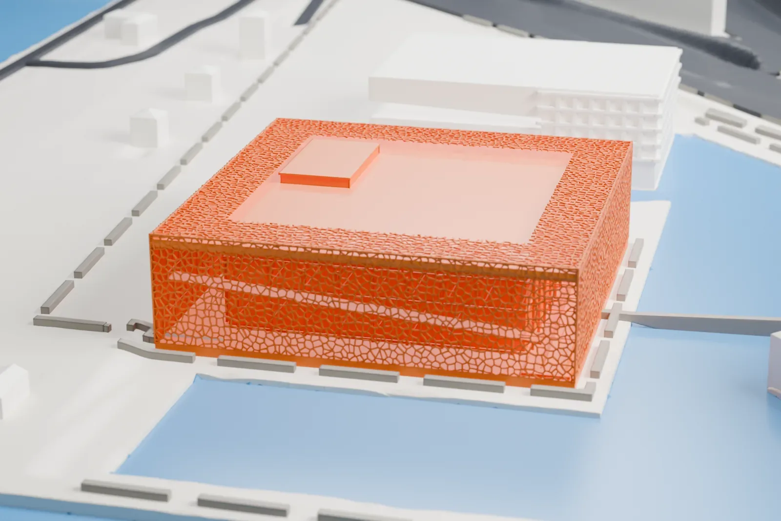 A white 3D print of the Mucem with a square roof and lattice shell, surrounded by water, open paving, nearby buildings and a narrow bridge.