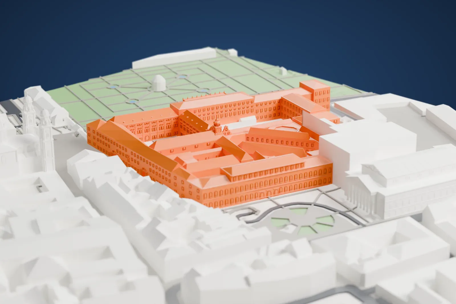 A white 3D print of the Munich Residenz, a long palace of joined wings standing among city streets and buildings.