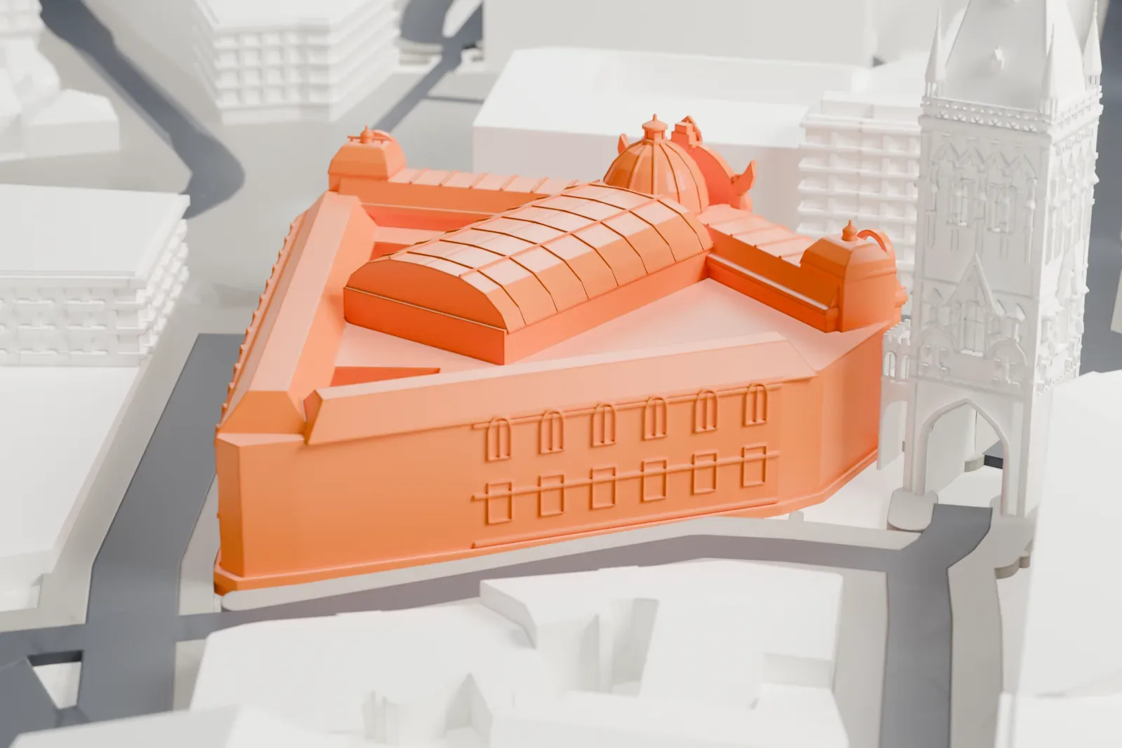 A white 3D print of the Municipal House among the surrounding streets and buildings.