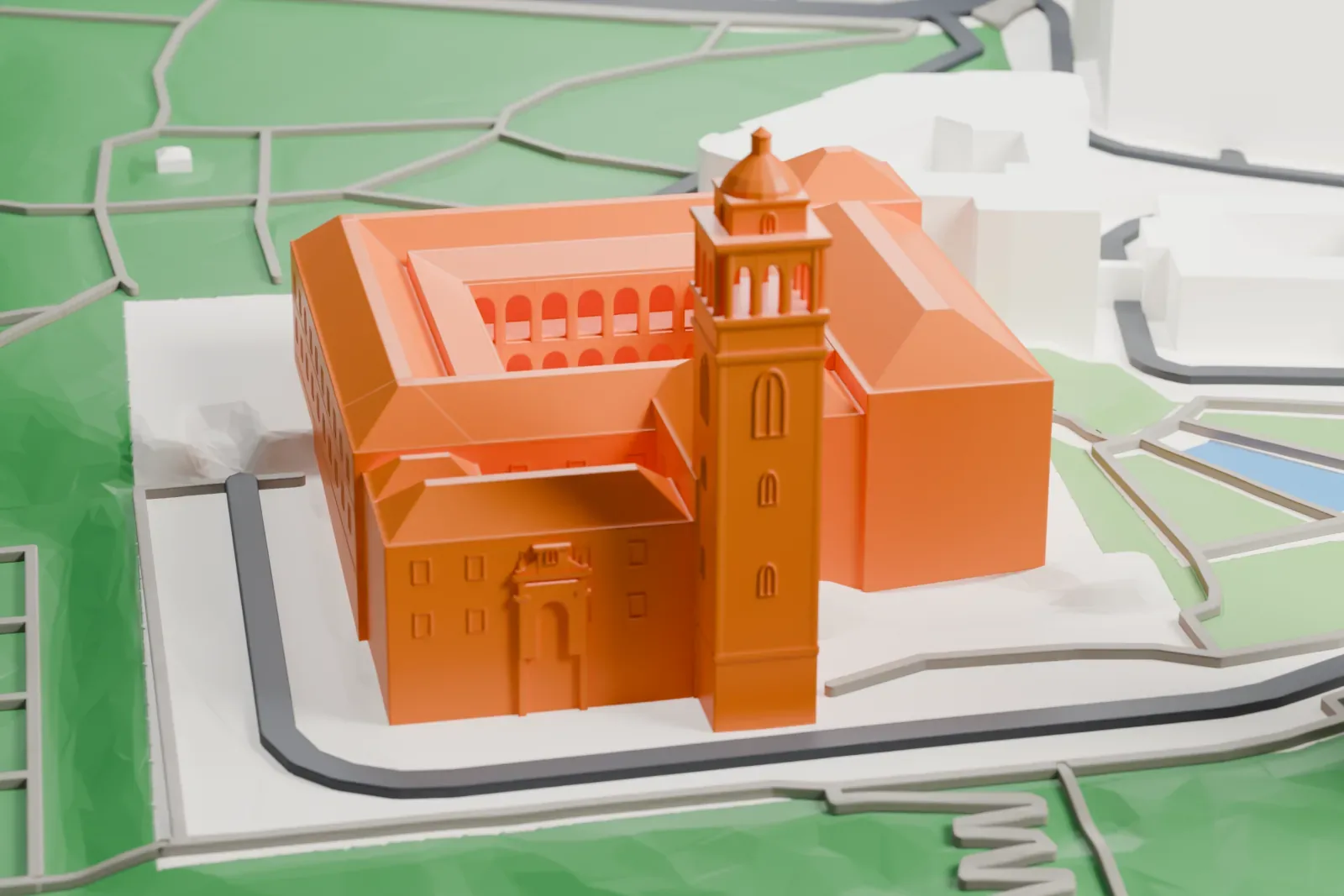 A white 3D print of the Museo de América, a museum building, among the surrounding city streets and buildings.
