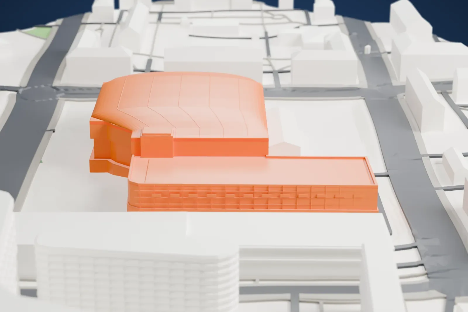 A white 3D print of Mytishchi Arena among the surrounding streets and buildings of Mytishchi.
