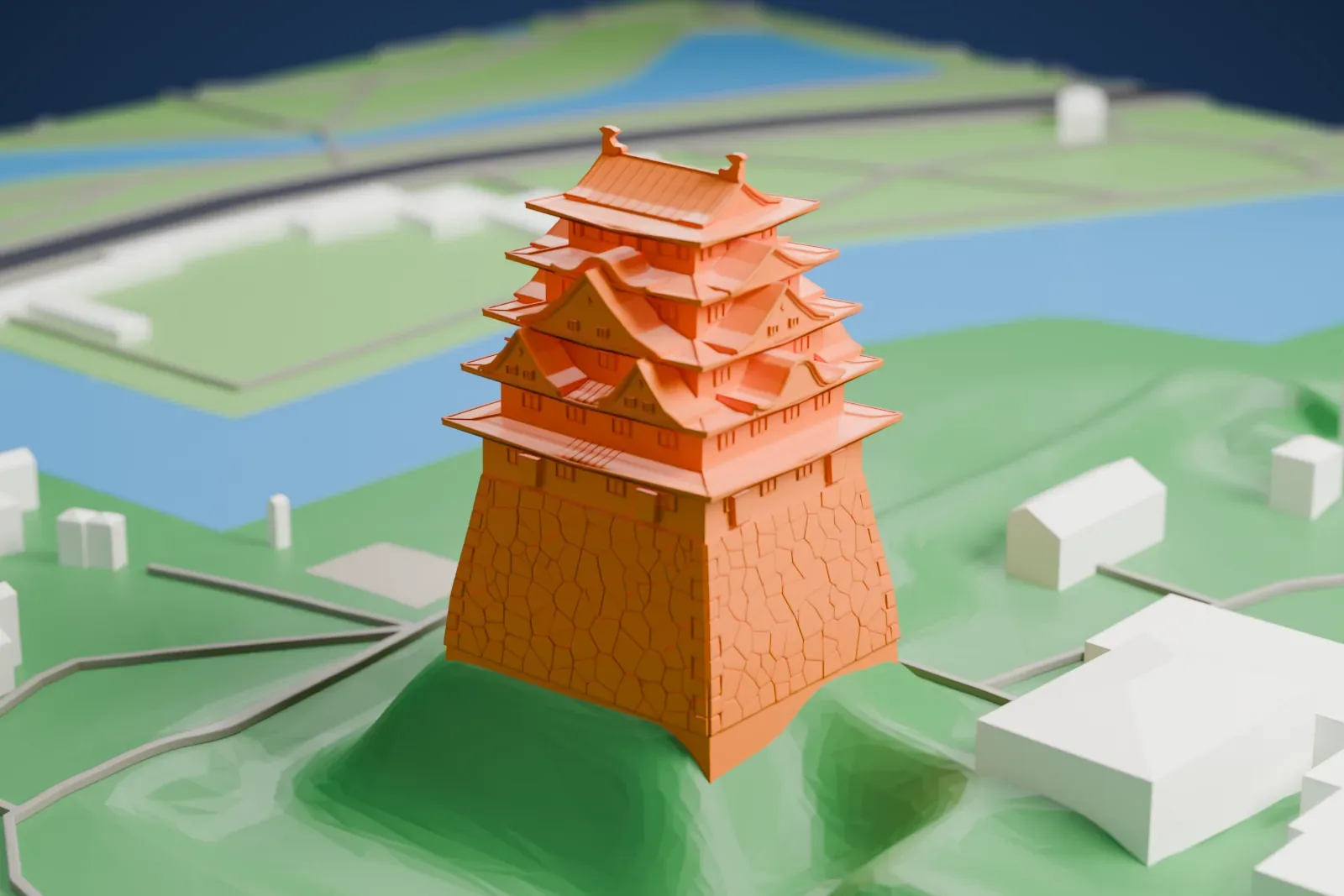 A white 3D print of Nagoya Castle, a five-tier Japanese keep with deep eaves, a stone base and paired roof ornaments, surrounded by city buildings.