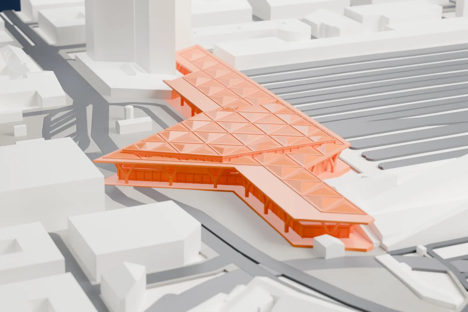 A white 3D print of Napoli Centrale railway station, a long terminus building, beside Piazza Garibaldi in Naples.