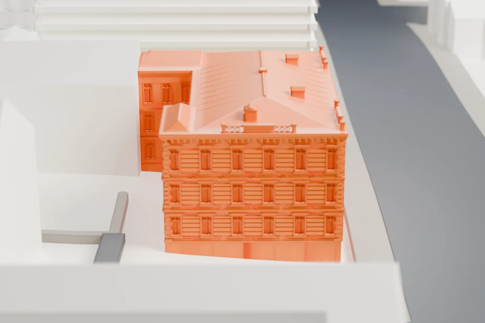 A white 3D print of the academy's headquarters on Volodymyrska Street in Kyiv, with surrounding streets and buildings.
