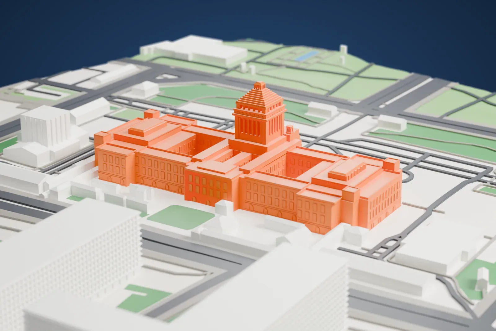 A white 3D print of the National Diet Building in Tokyo, shown among the surrounding streets and buildings.
