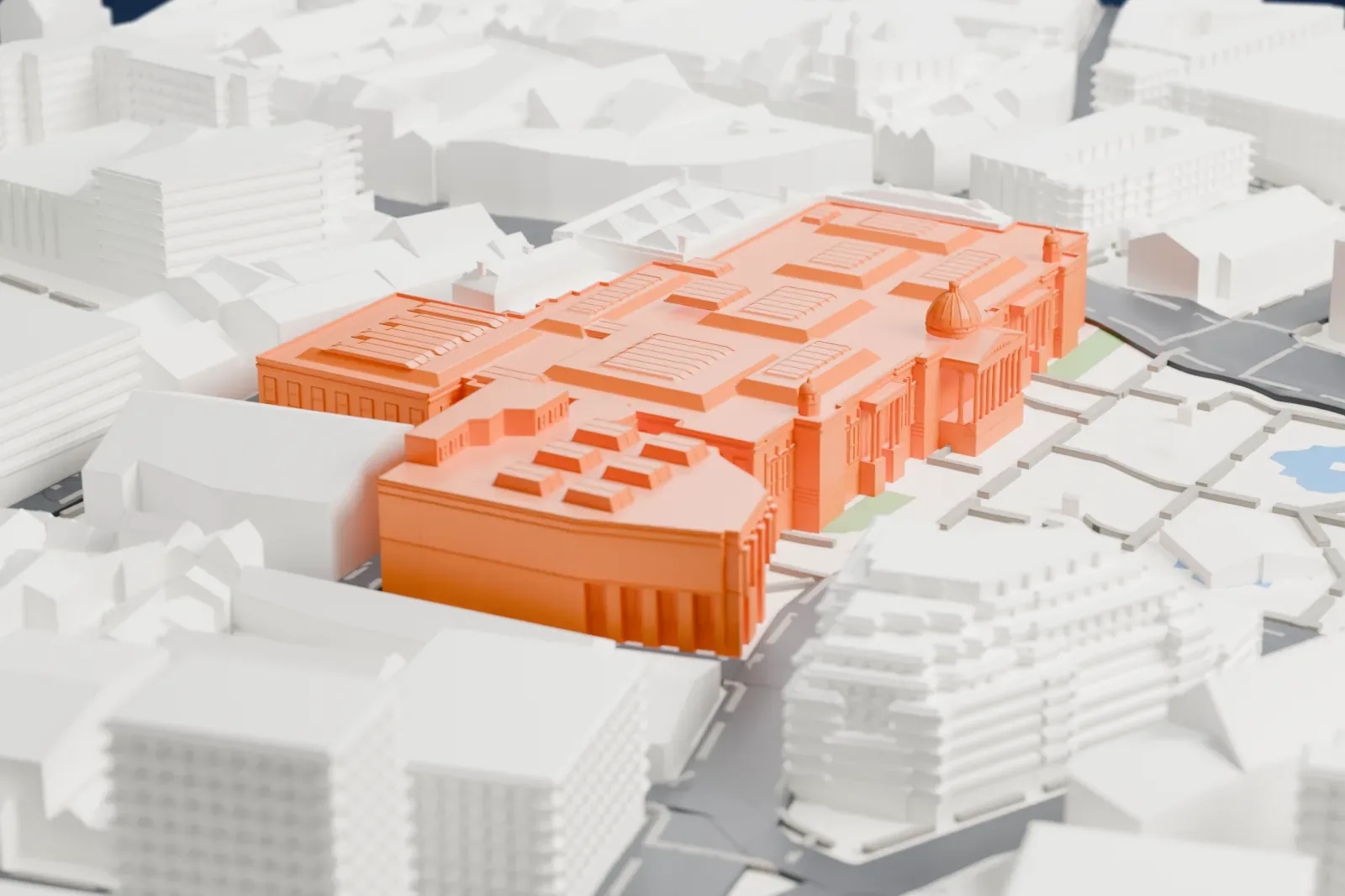 A white 3D print of the National Gallery, a wide, low building with a small dome and flat roofs, facing a paved square with two fountain pools and a tall column, among larger buildings.