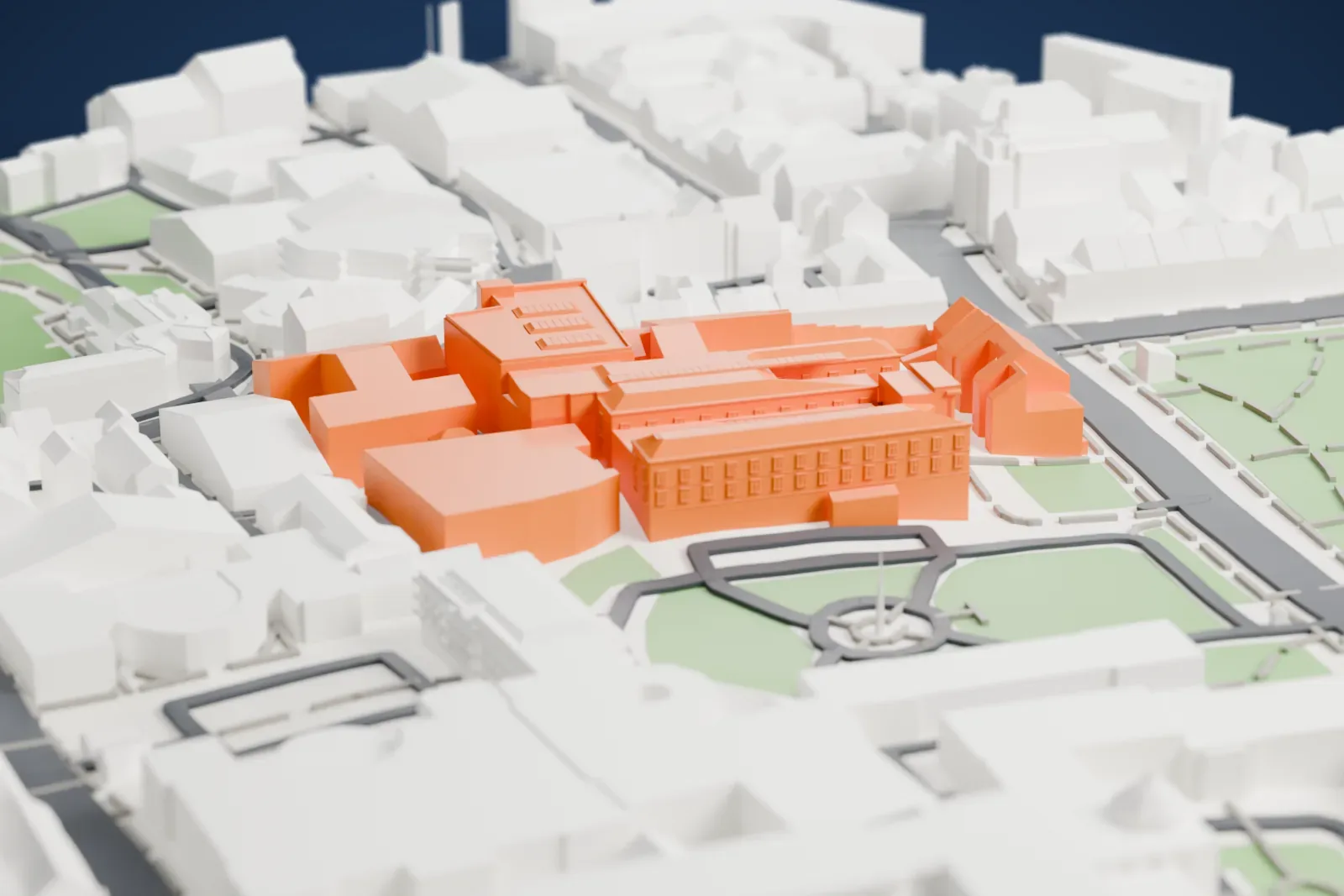 A white 3D print of the National Gallery of Ireland, a group of long museum wings with skylit roofs, beside park lawns and surrounded by streets and nearby buildings.