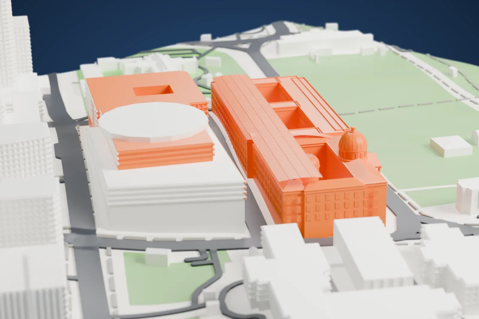 A white 3D print of National Gallery Singapore, a long building with two domes, a columned portico and a ridged roof, beside lawns and city buildings.