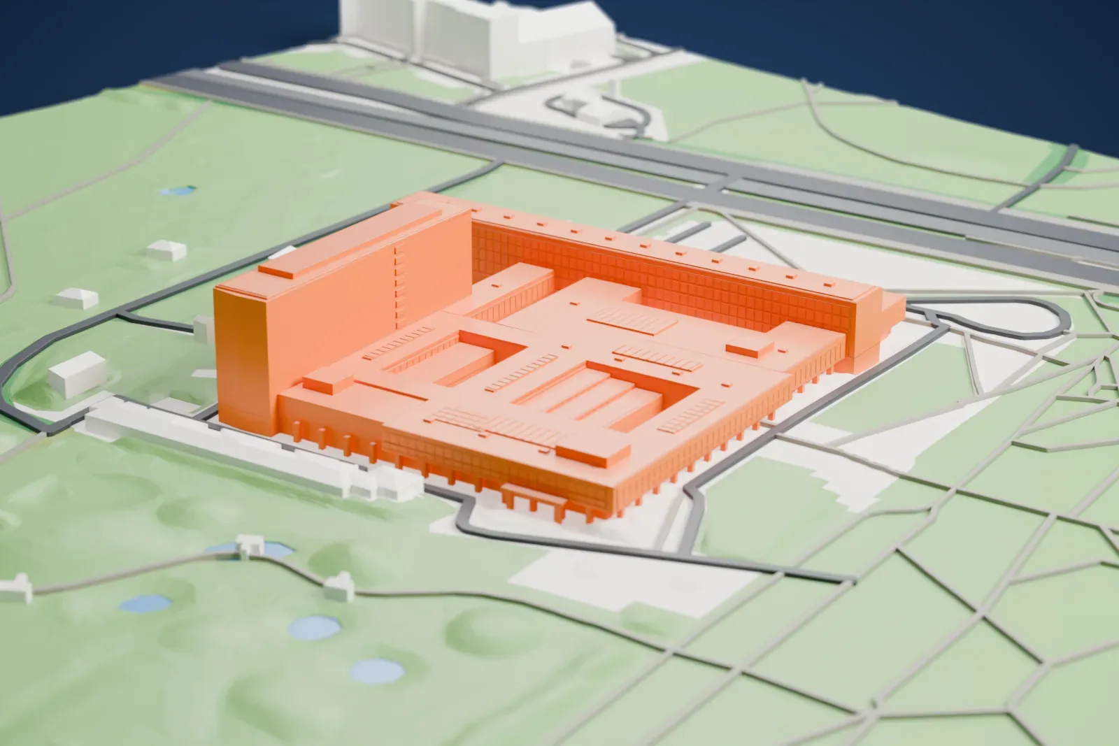 A white 3D print of the National Library of Poland on its Warsaw site, with surrounding streets and buildings.