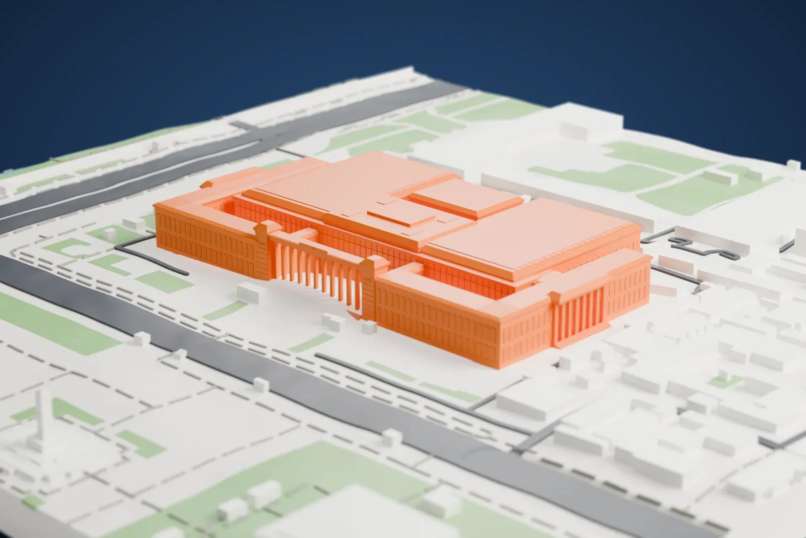 A white 3D print of the National Museum of China, a very wide, low rectangular building with stepped flat roofs and a row of pillars at the front, set among broad roads, open paved ground and small green areas.
