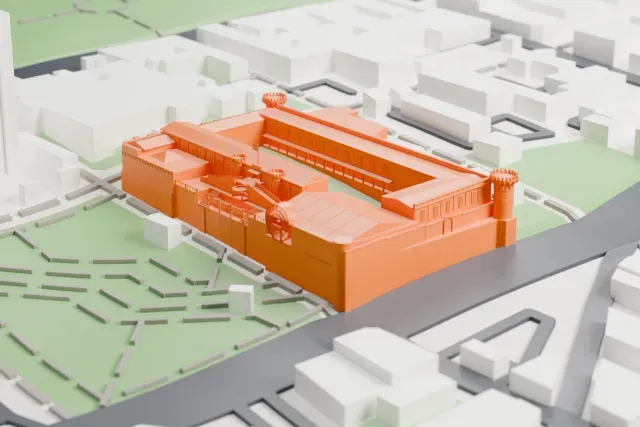 A white 3D print of the National Museum of Costa Rica, a fort-like building around a square courtyard with round corner towers, among city blocks and small parks.