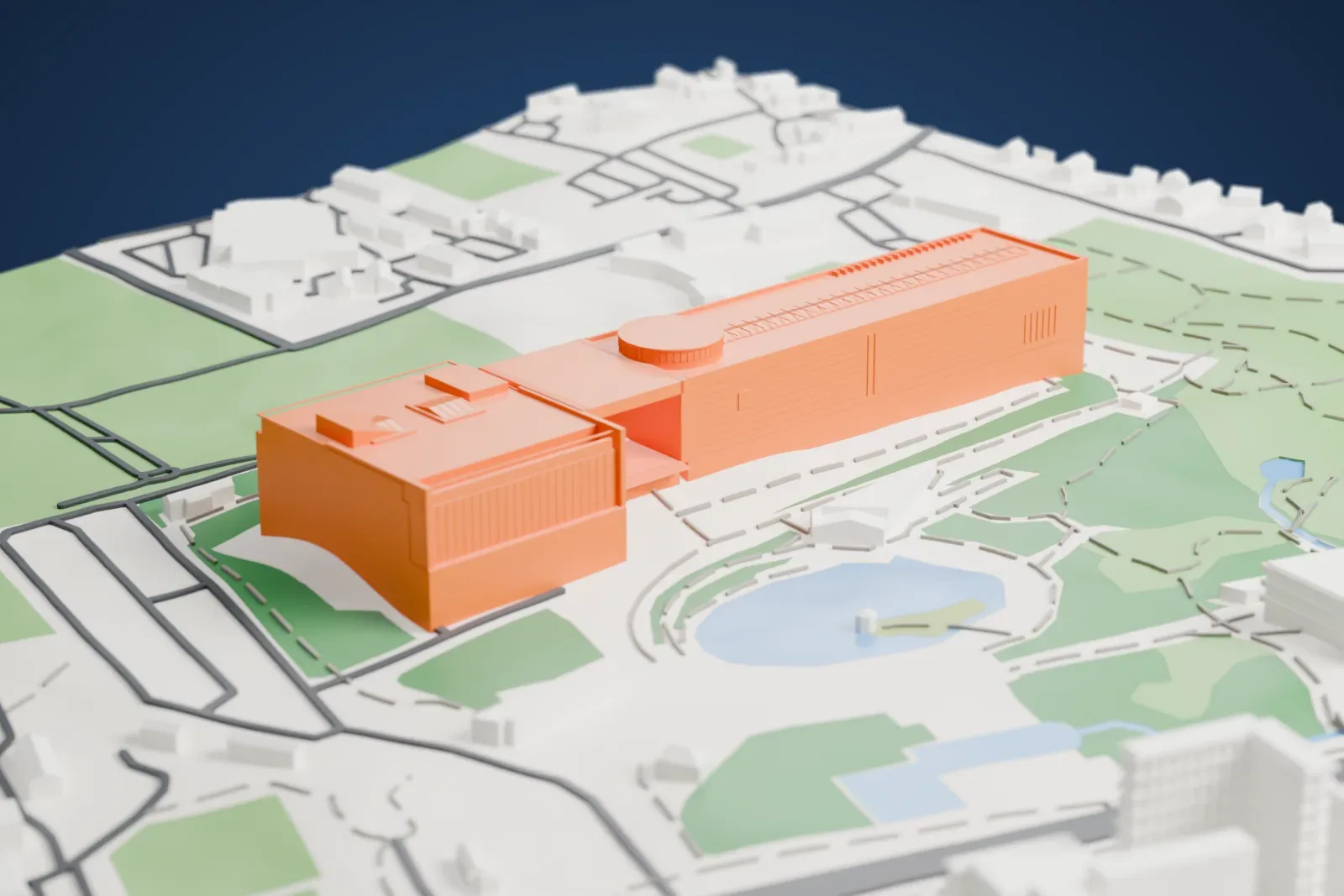 A white 3D print of the National Museum of Korea, a very long, low building with a round drum on its roof and a second block at one end, beside a pond and park paths.