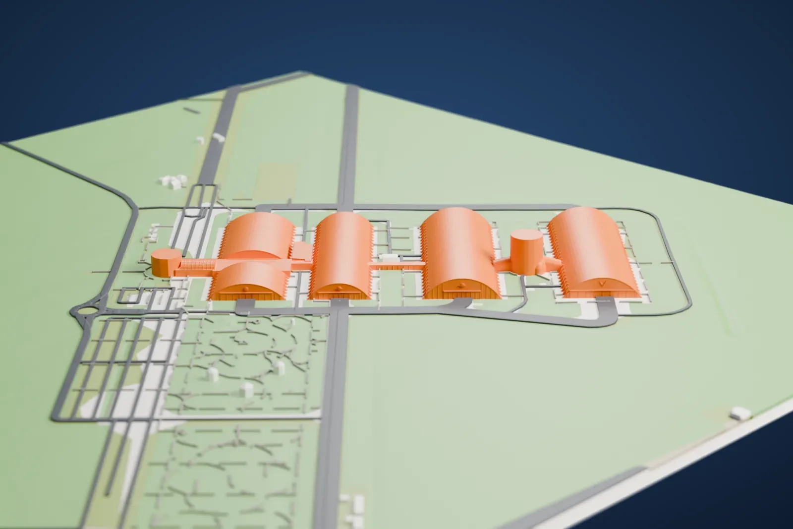 A white 3D print of long arched hangars and round towers of the National Museum of the United States Air Force, set on a broad grassy site crossed by roads and paved strips.