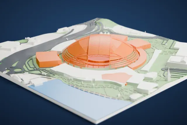 A white 3D print of the National Stadium in Singapore, a large domed stadium crossed by arched ribs, surrounded by big low buildings, roads and green areas, with water at the edge.
