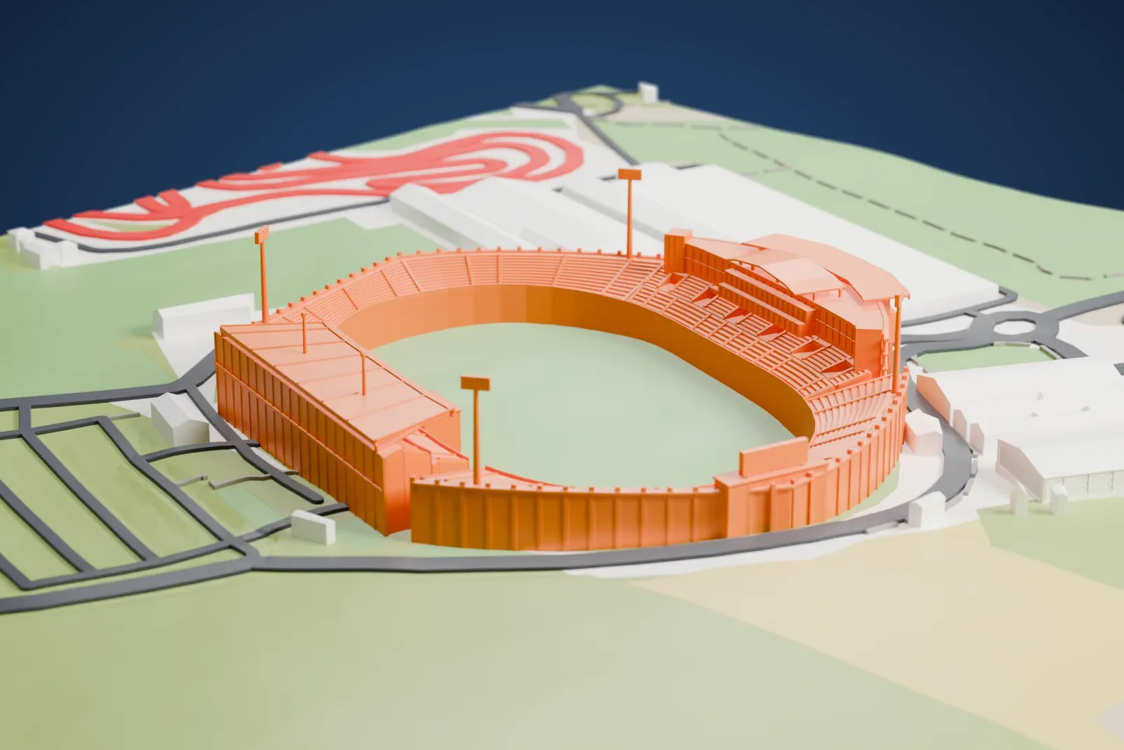 A white 3D print of the National Stadium at Ta' Qali, an oval bowl with a long flat-roofed stand, a taller stand block behind it and four corner masts, among the surrounding streets and buildings.