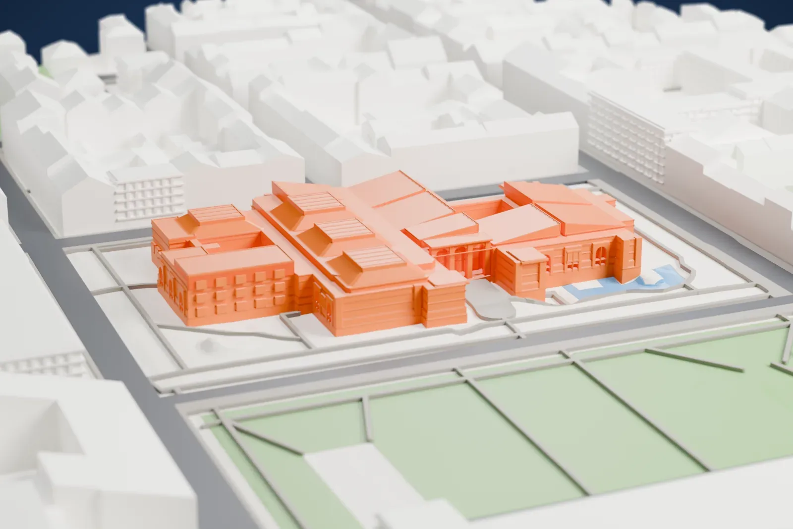 A white 3D print of the Neue Pinakothek, a wide museum building set among the surrounding streets and buildings.