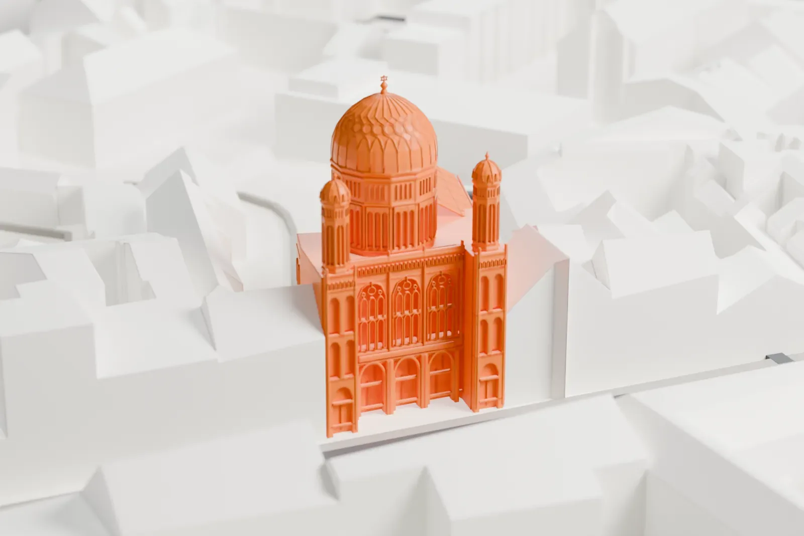A white 3D print of the New Synagogue on Oranienburger Straße in Berlin, with the surrounding streets and buildings.