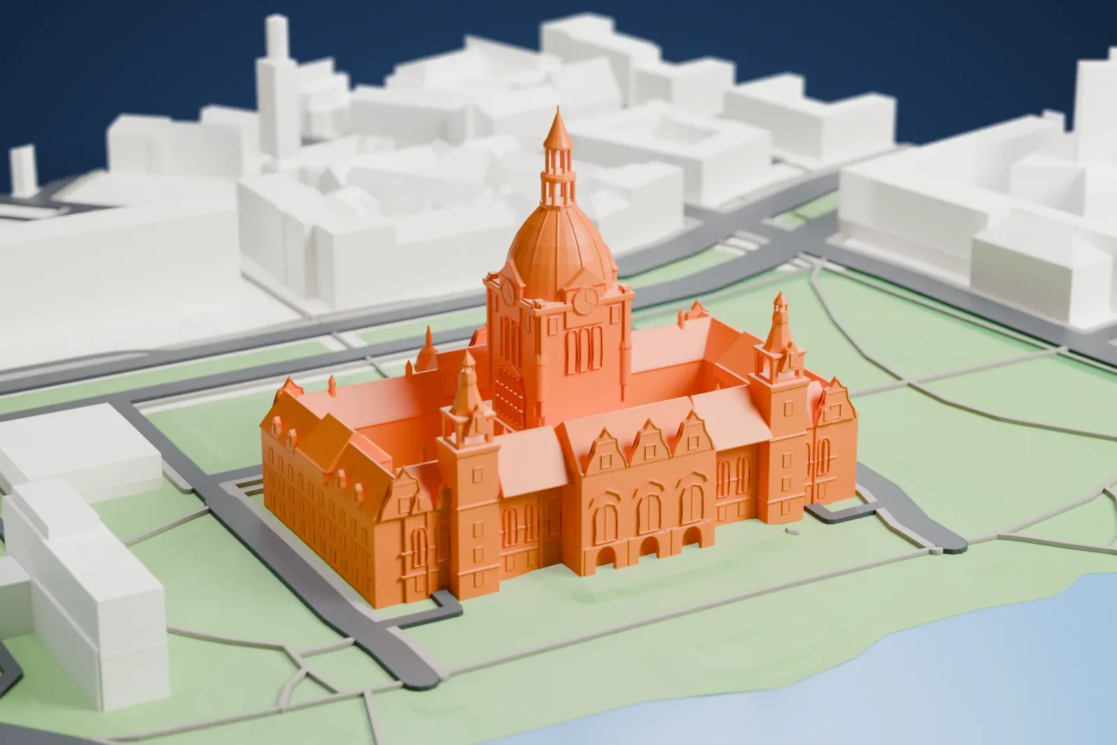 A white 3D print of the New Town Hall in Hanover, a large domed building set in the Maschpark.