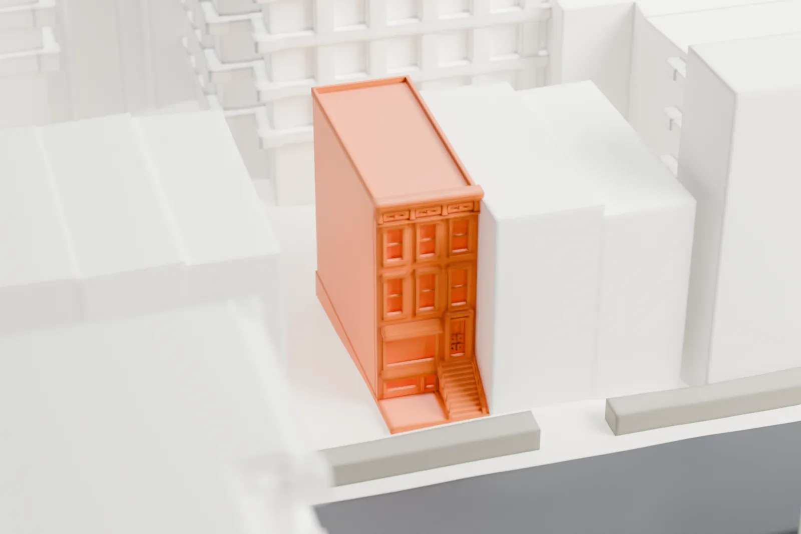 A white 3D print of the New York Amsterdam News Building, a narrow rowhouse among blocks of mid-rise buildings and streets.