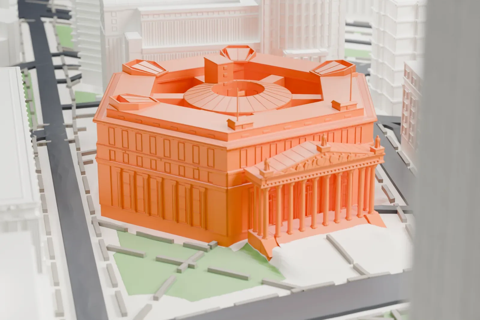 A white 3D print of the New York County Courthouse, a hexagonal building with a columned front and a round feature at the center of its roof, beside plazas and tall buildings.