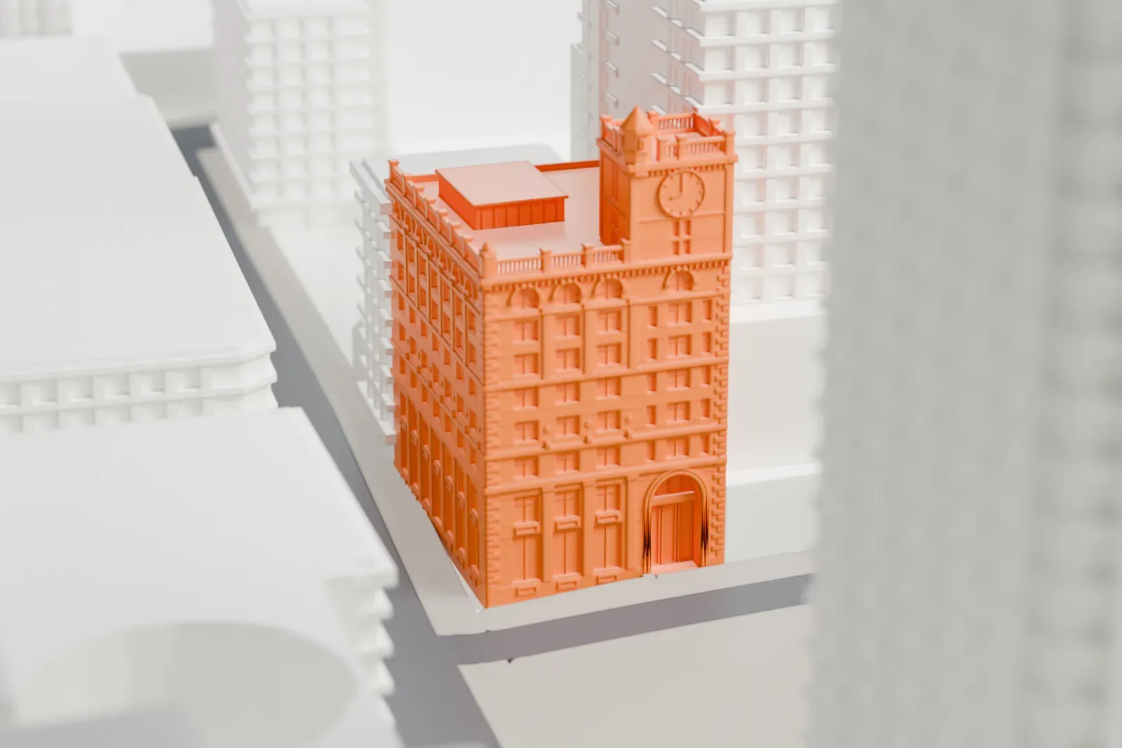 A white 3D print of the New York Life Insurance Building among the surrounding streets and buildings.