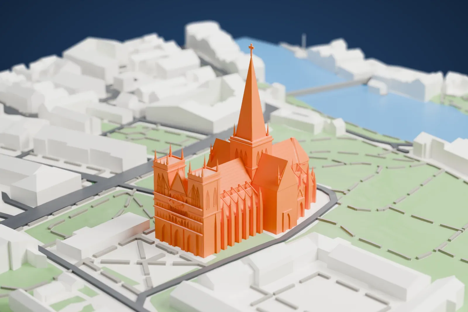 A white 3D print of Nidaros Cathedral, a long cathedral with a tall central spire and two western towers, set in green grounds with winding paths, roads and a few low buildings.