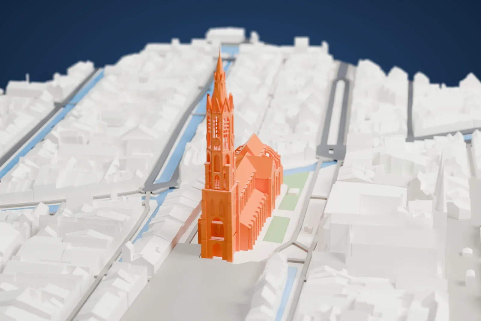 A white 3D print of the Nieuwe Kerk, its tall tower rising over Delft Market Square among the surrounding buildings.