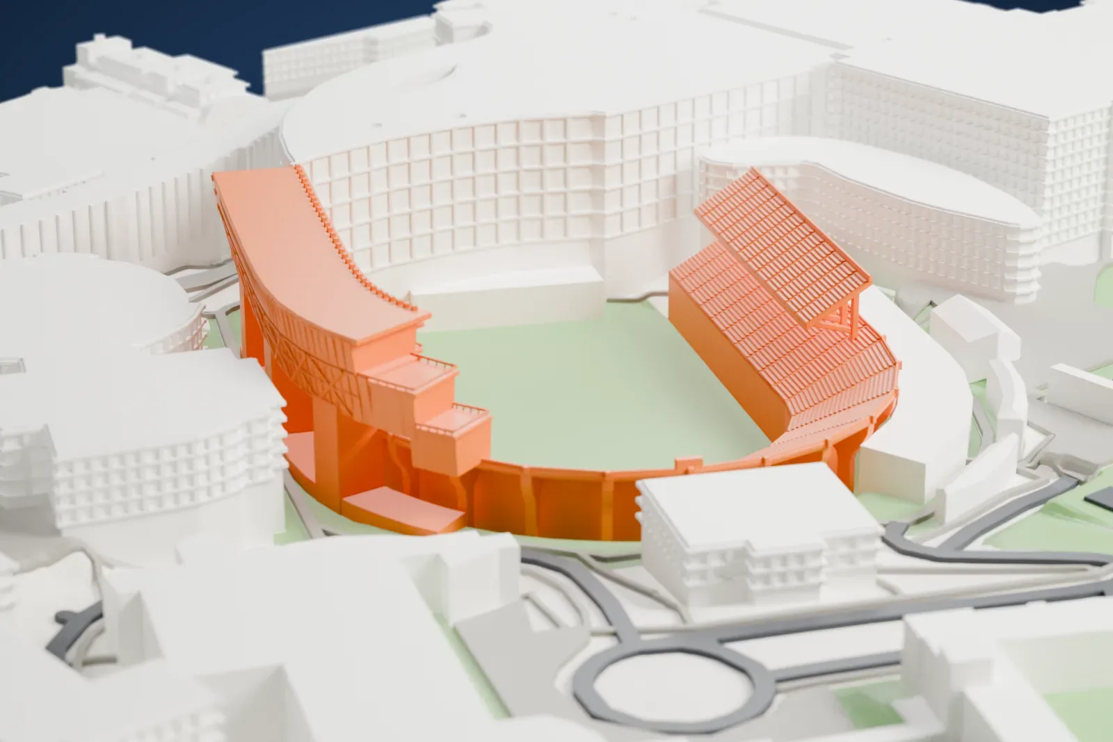 A white 3D print of Nippert Stadium, an open football bowl with a splayed west pavilion, among campus buildings.