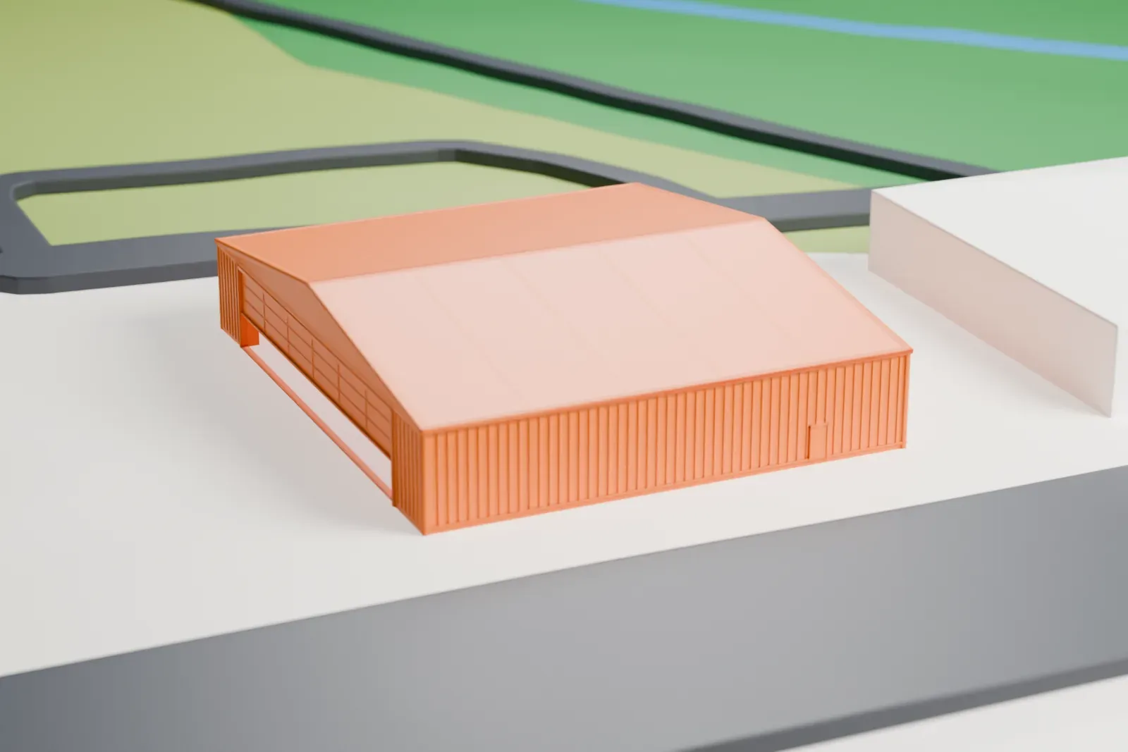 A white 3D print of the North Carolina Aviation Museum hangars, a broad low hangar with a shallow gabled roof and lettering on its wall, beside roads and grass.