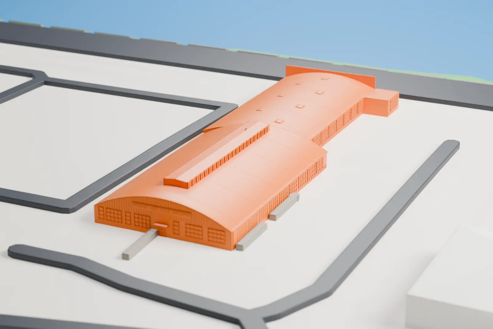 A white 3D print of the Oakland Aviation Museum Hangars with adjoining curved roofs, beside water and surrounded by roads, open ground and buildings.