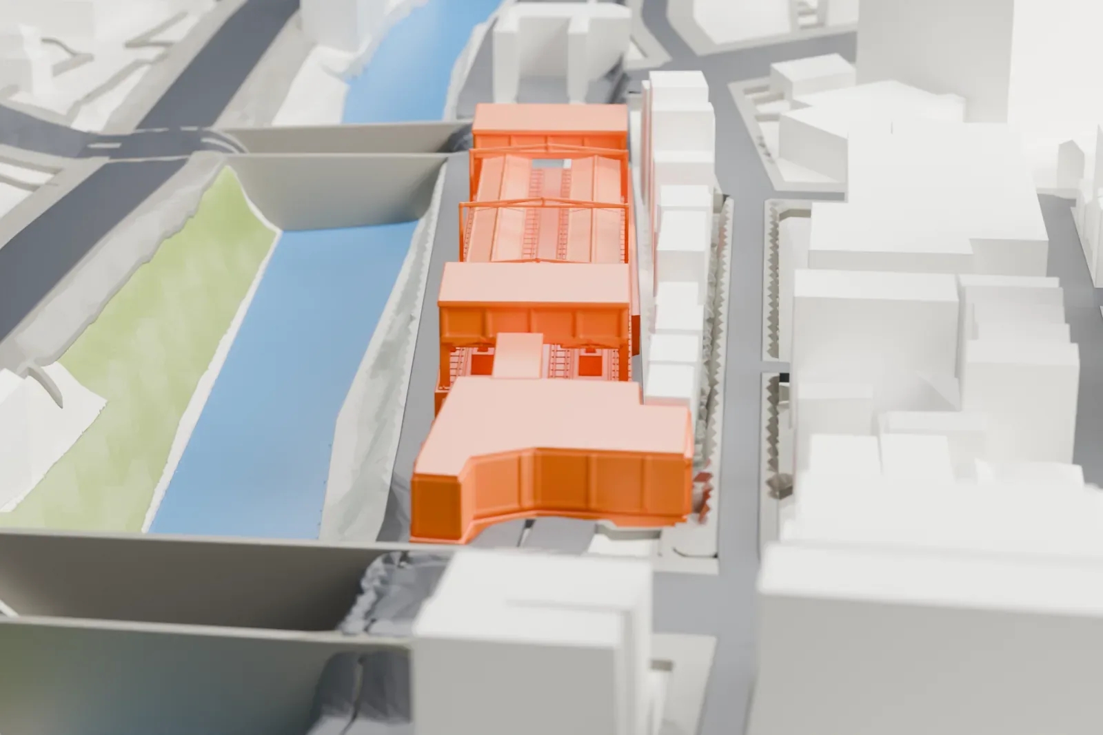 A white 3D print of Ochanomizu Station beside the Kanda River, among the surrounding streets and buildings of Tokyo.