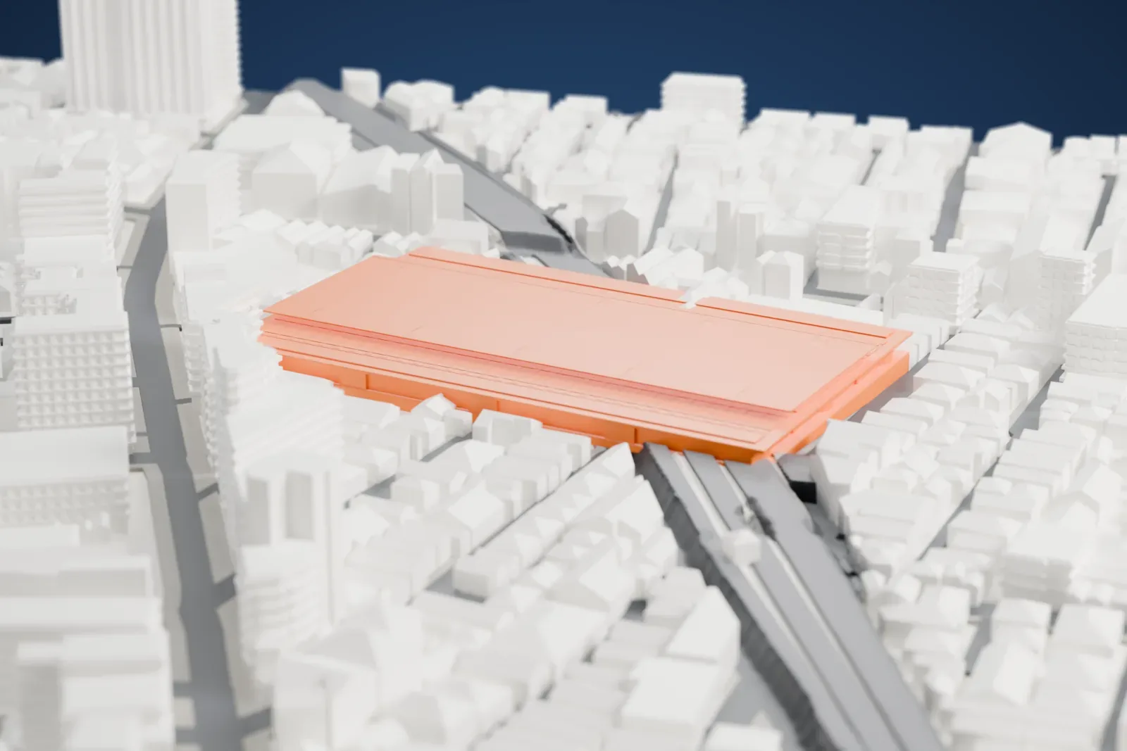 A white 3D print of Ōkubo Station in Tokyo, surrounded by streets and buildings.