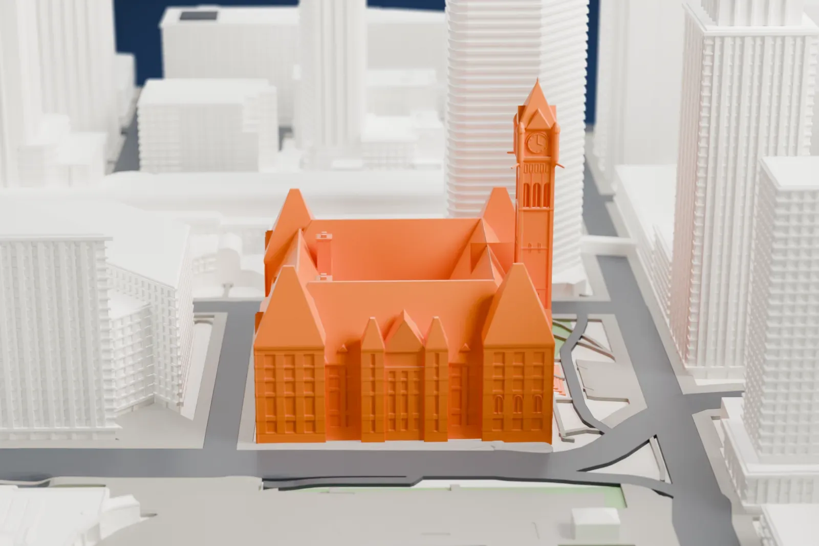 A white 3D print of Old City Hall in Toronto among the surrounding streets and buildings.