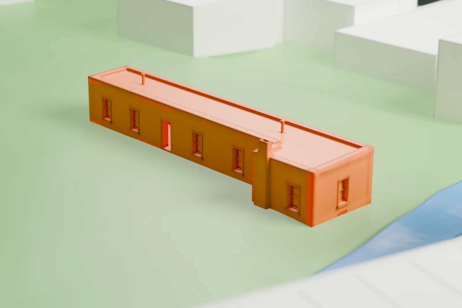 A white 3D print of the Old Las Vegas Mormon Fort State Historic Park, a long, low flat-roofed building on green parkland with a stream beside it and larger buildings nearby.