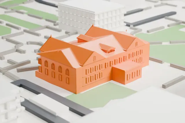 A white 3D print of Old Main at Arizona State University, a building with two projecting gables, a hipped roof and a wide front stair, set among lawns and campus paths.