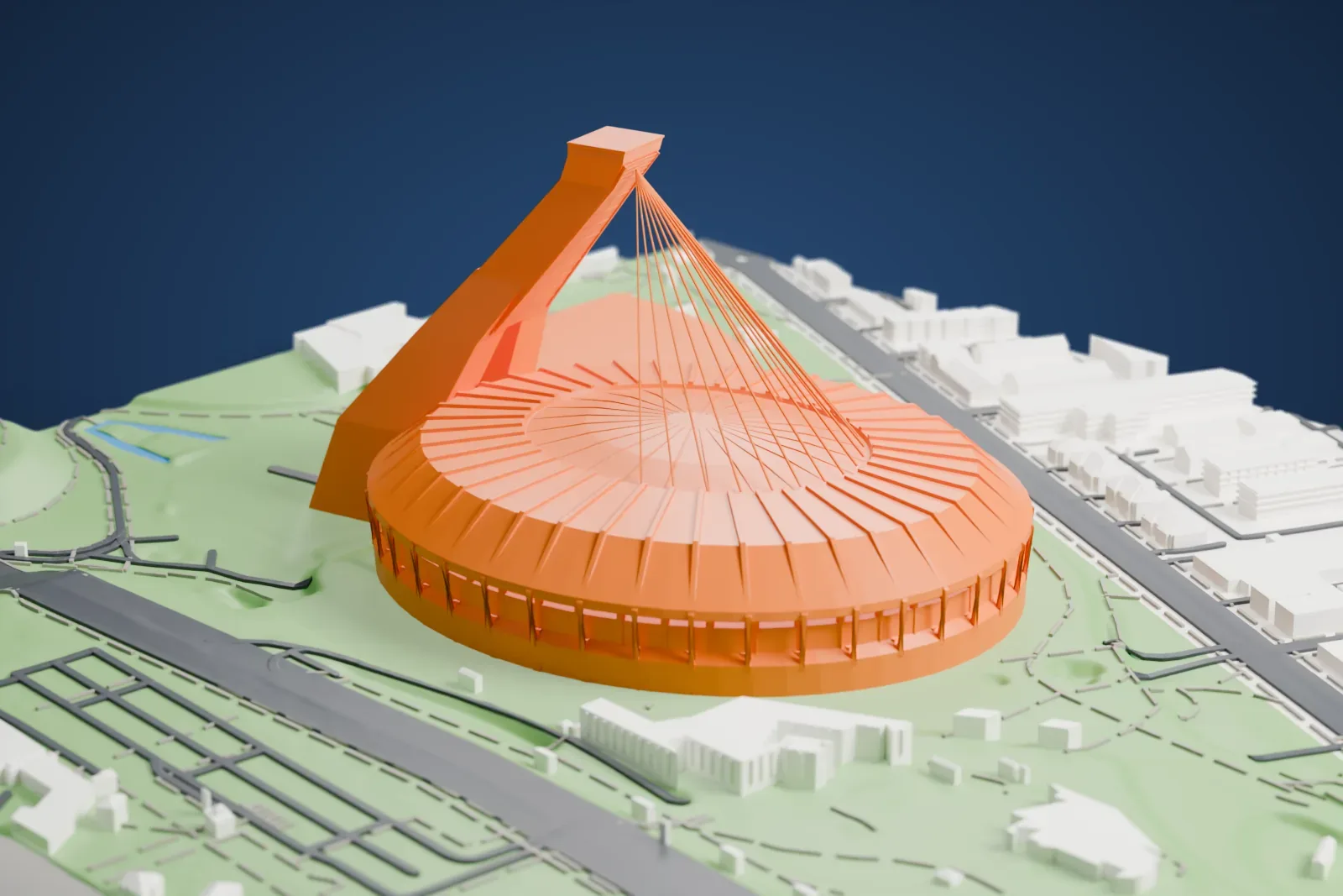 A white 3D print of the Olympic Stadium in Montreal, a round ribbed bowl with a tall leaning tower and a fan of cables, standing in green parkland with roads and a curved gray building nearby.