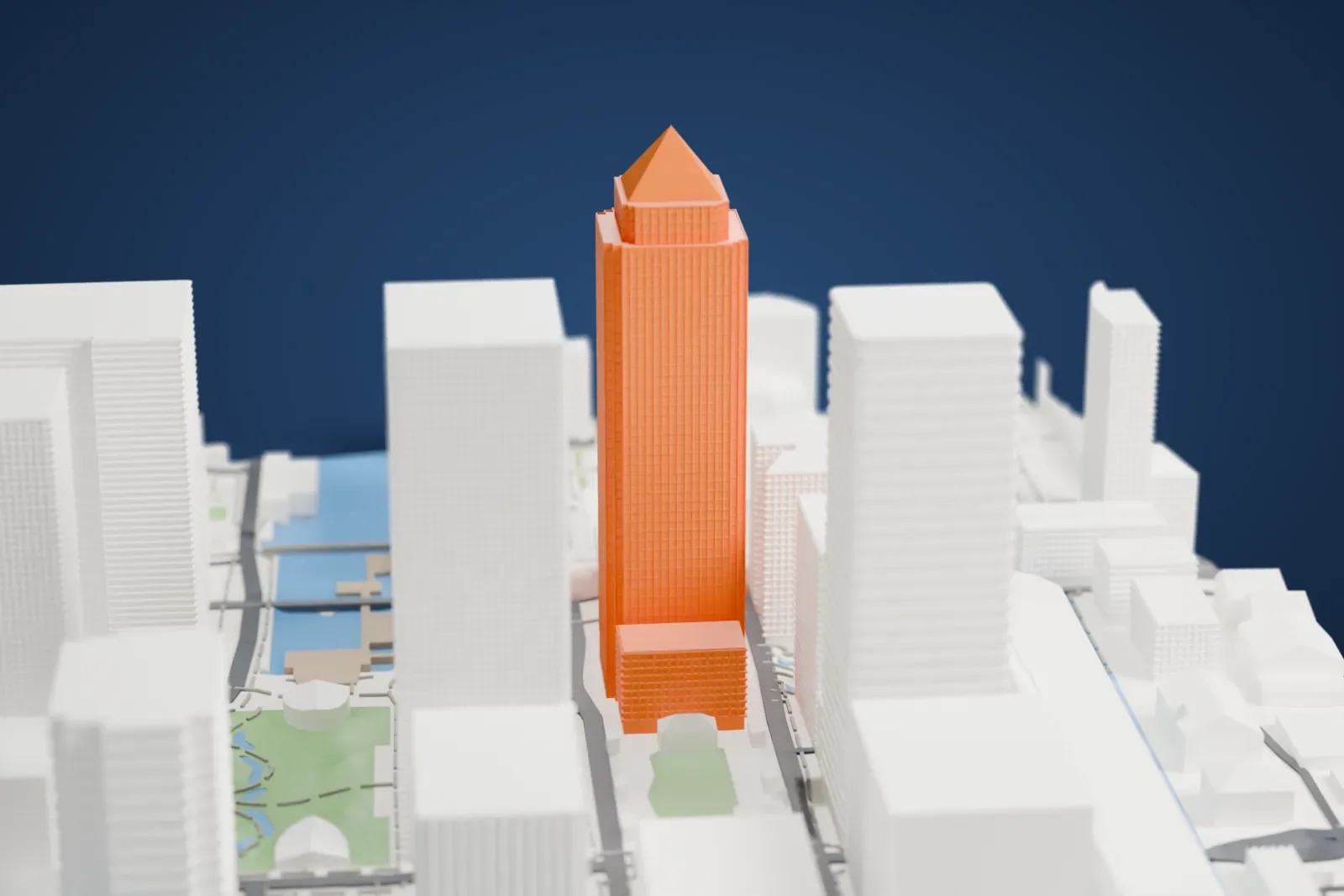 A white 3D print of One Canada Square, a tall slim square tower with a pyramid roof, standing among other tall towers, with water and small parks nearby.