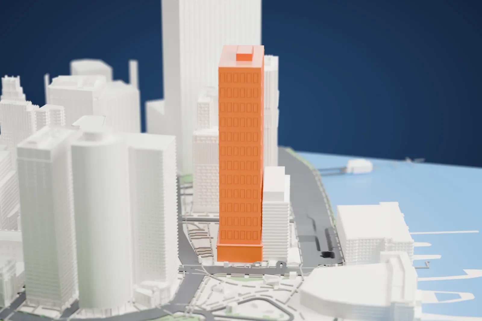 A white 3D print of the One New York Plaza tower with a patterned facade and raised rooftop block, surrounded by towers, streets, and waterfront.