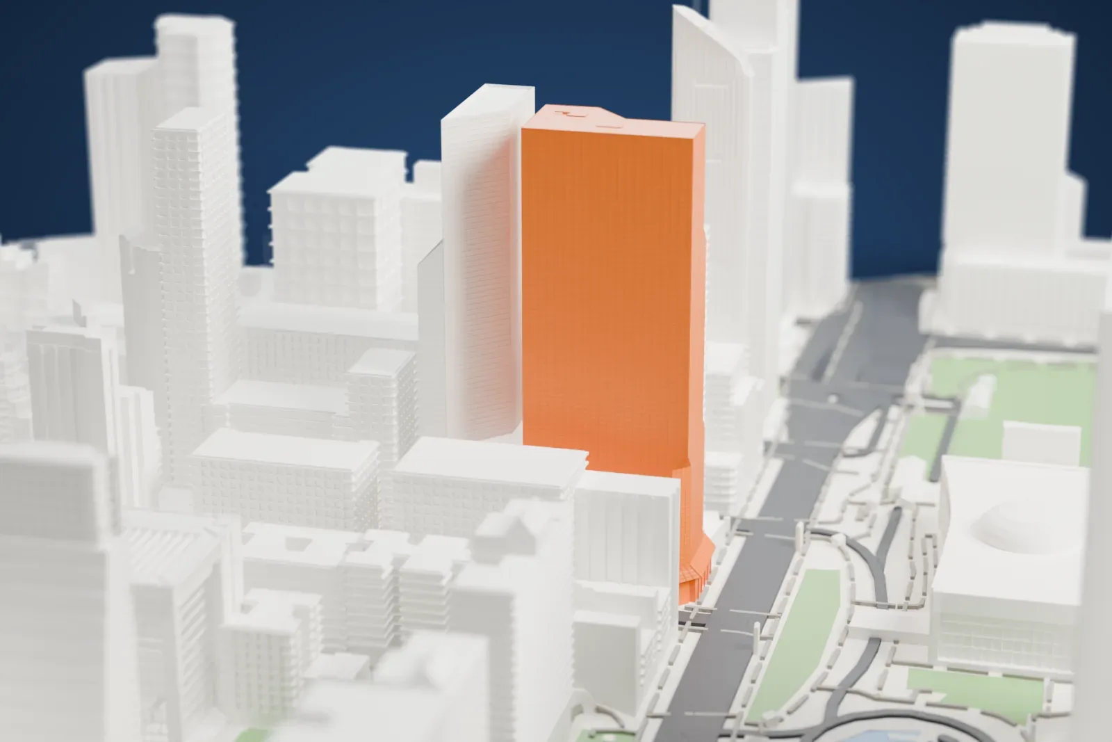A white 3D print of One United Nations Plaza, a tall gridded tower with sloping upper walls, among crowded Midtown buildings, with roads, green strips and a domed building nearby.