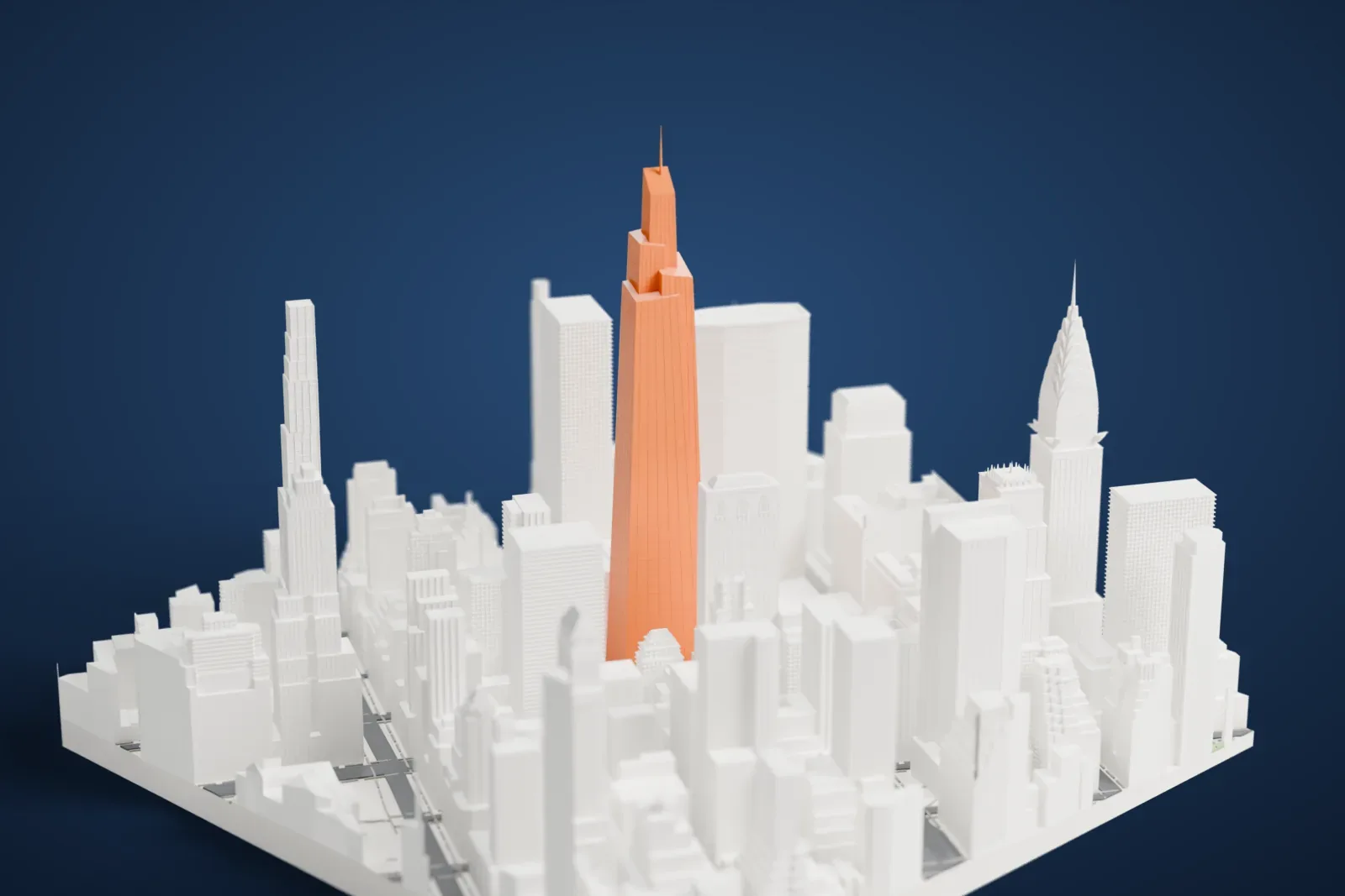 A white 3D print of One Vanderbilt, a tall tapering skyscraper with a stepped crown and a thin spire, standing among dense surrounding towers.