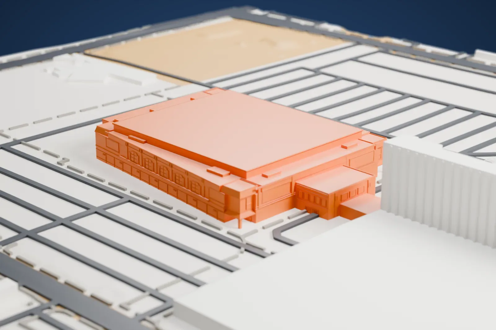 A white 3D print of Orleans Arena, a wide boxy arena with a flat roof and an attached lower wing, among streets and neighboring buildings.