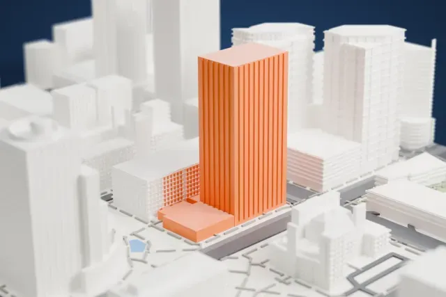 A white 3D print of the Orpheum Theatre model in Phoenix, with the streets around it.
