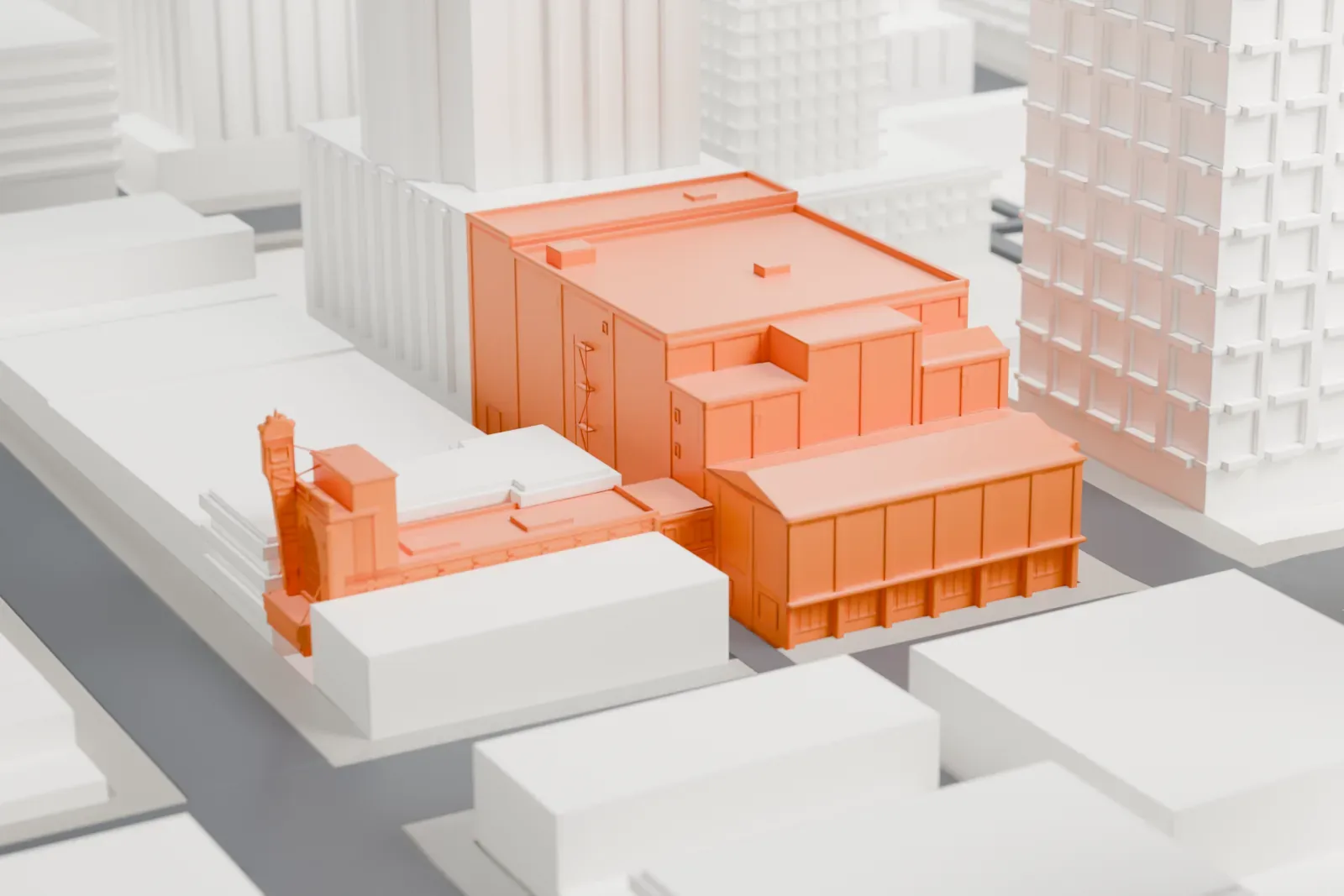 A white 3D print of the Orpheum among the surrounding streets and buildings.