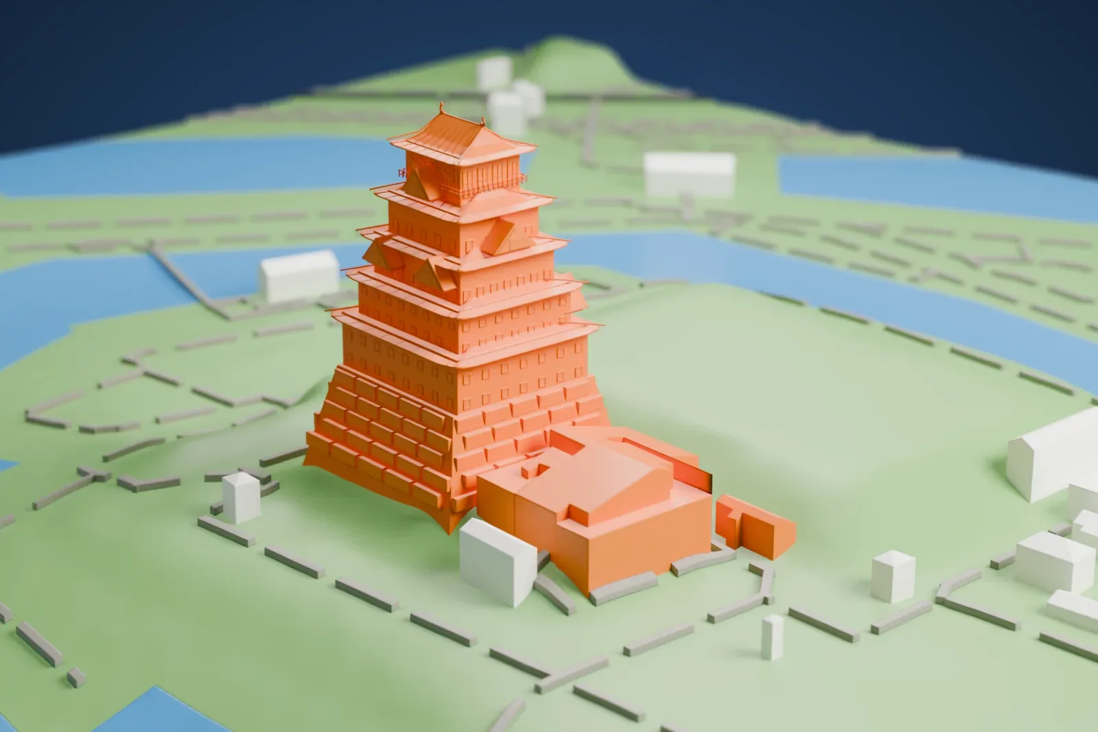 A white 3D print of Osaka Castle, a tiered keep with layered roofs on a stone base, surrounded by green grounds and blue moat water.