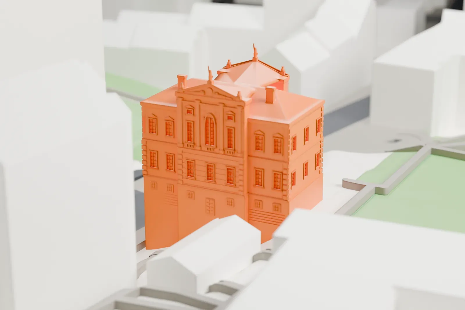 A white 3D print of the Ostrogski Palace on Tamka Street in Warsaw, among the surrounding city buildings.