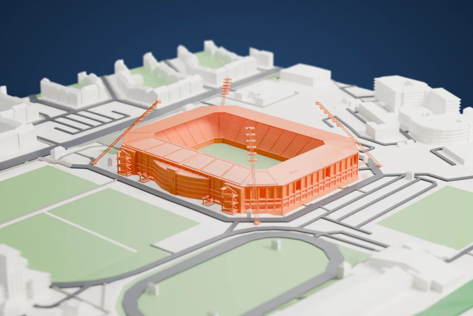 A white 3D print of Ostseestadion, a football stadium with four tall lattice floodlight masts around an open roof, among surrounding buildings.