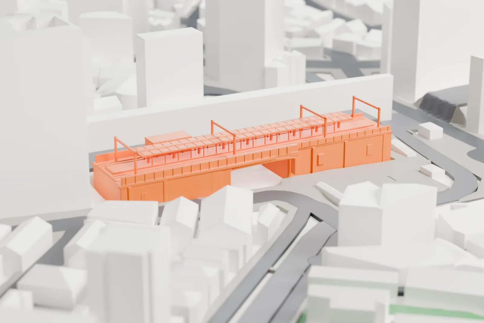 A white 3D print of Ōtsuka Station, a low station building among the surrounding streets and buildings.